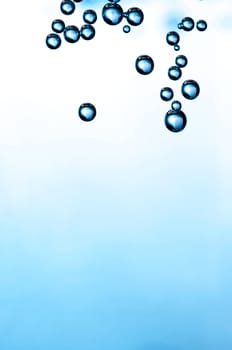 Gradient background with bubbles in a corner.