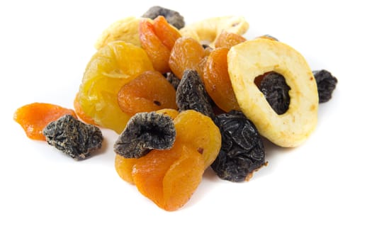 A picture of a bunch of dried fruits on a white background