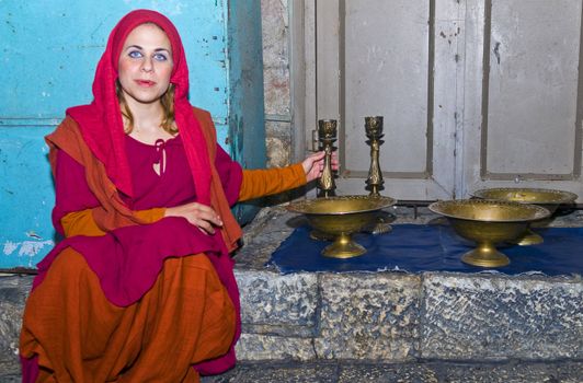 JERUSALEM - NOV 03 : An Israeli actress proform in the annual medieval style knight festival held in the old city of Jerusalem on November 03 2011