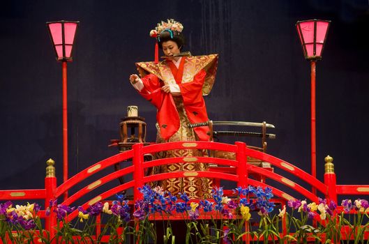 NIKKO , JAPAN - OCT 30 : An unidentified performer in the "Water magic" show held on October 30 2009 in Nikko Japan , "Water magic" is a Japanese traditional theater art  