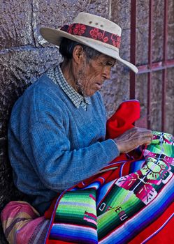 CUSCO , PERU - MAY 27 2011 : An unidentified Peruvian man in a local market. 