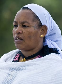 JERUSALEM - NOV 24 : Portrait of Ethiopian Jew woman during the Sigd holiday in Jerusalem . Israel on November 24 2011 , The Jewish Ethiopean community celebrates the Sigd annualy in Jerusalem