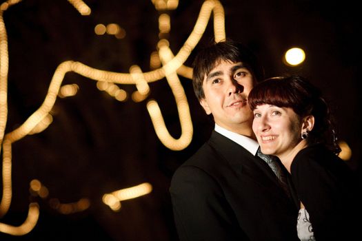 groom and bride at night