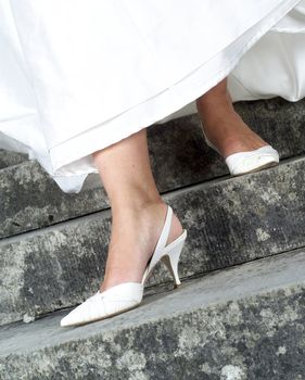 Bride walking the stairs with High Heels