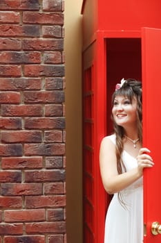 bride in the red telephone cabin