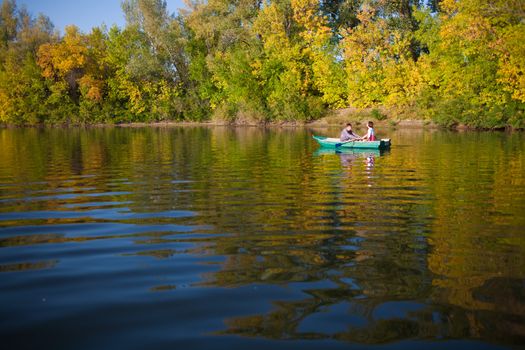 couple in a boat outdoors