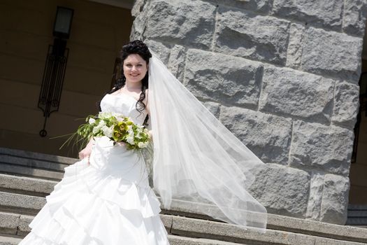 bride by the stone wall