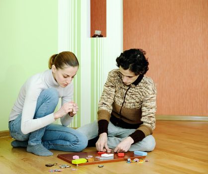 Young couple sculpts out of clay