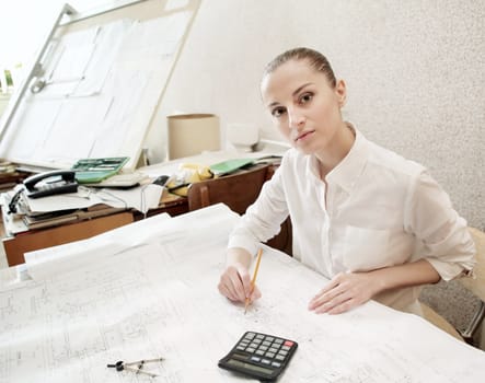 An image of a young woman architect