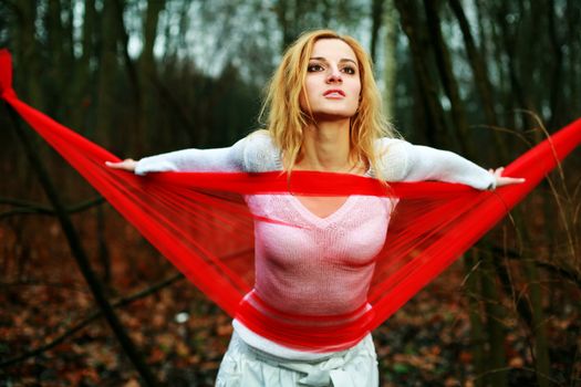 An image of a young girl with red cloth