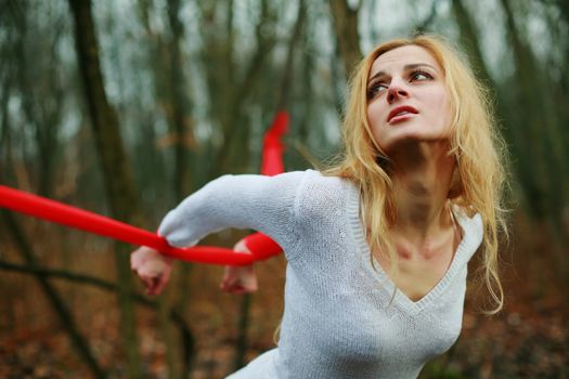 An image of woman bonded with red stripe