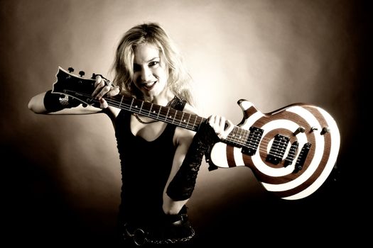 An image of a beautiful girl with guitar