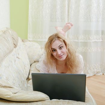 An image of a nice woman on a sofa