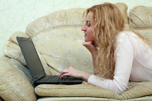 An image of a girl with a laptop