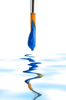 Stock photo: an image of a brush with blue paint on it