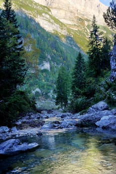 River in mountains in the italian alps