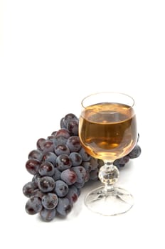 An image of grape and wineglass