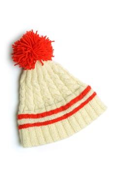 An image of a warm hat with red bob