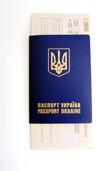 An image of a passport of a citizen of Ukraine with tickets in it