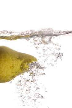 A pear falling in water