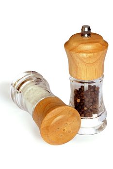 An image of two bottles of salt and pepper