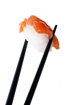 Stock Photo: Sushi with chopsticks shot on white