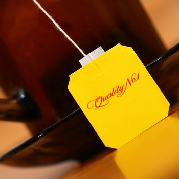 An image of yellow label on background of cup