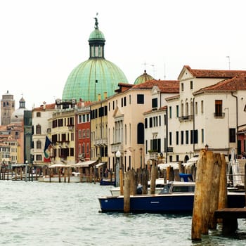 An image of a wide canal in Venice