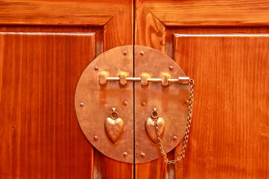 Traditional chinese old knocker on wood door