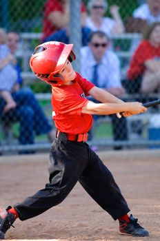 Little league baseball player at bat
