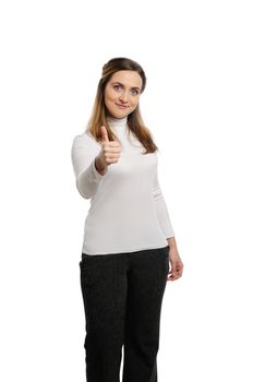 Beautiful young woman thumb up. Isolated on white background.