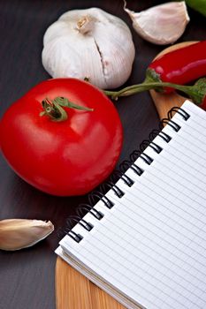 vegetables and cooking utensils for cutting table