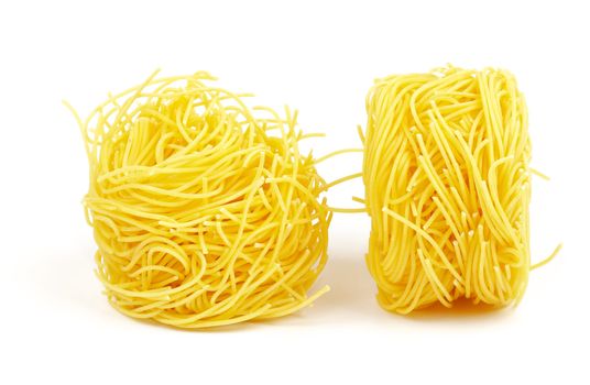 Fresh spaghetti noodles isolated on white background