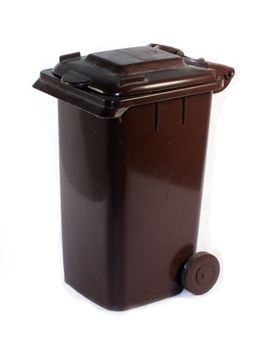 brown dirt container for garbage