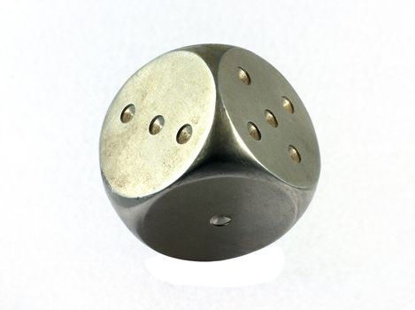 metal die with one two three and five dots