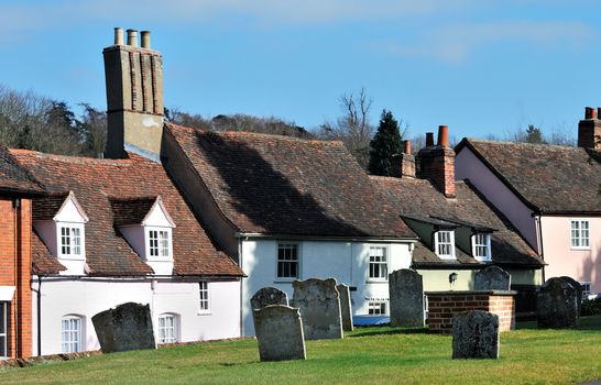 Old english village graveyard and cottages