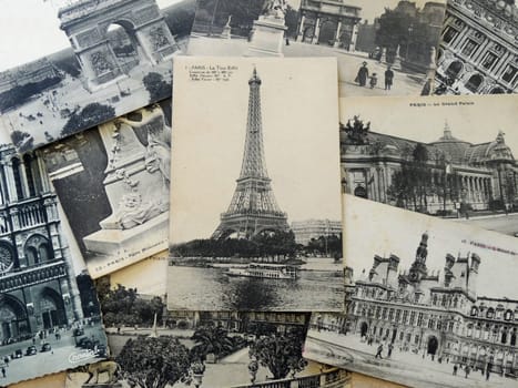 bunch of vintage postcards of Paris with the Eiffel tower