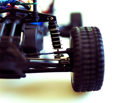 shock absorber with spring and other details of a suspension of the toy machine