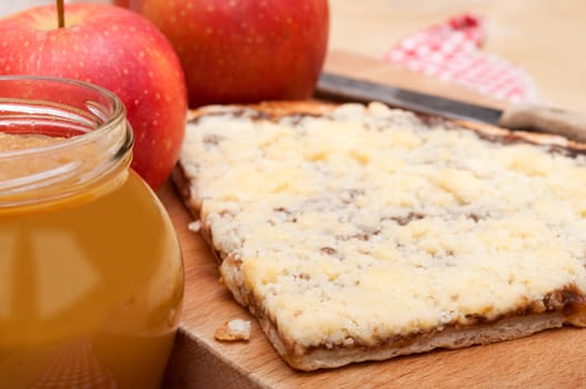Homemade Apple Pie With Apple Jam in Jar and Apples on Table