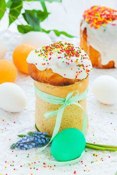 Easter cake and colorful eggs on festive Easter table