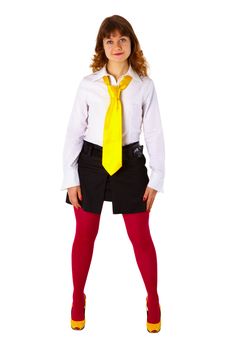 Young girl in red stockings and a yellow tie isolated on white background