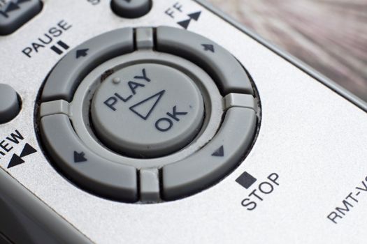 A closeup view of an old tv remote controller
