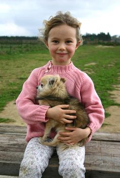 little girl and her best friend purebred chihuahua