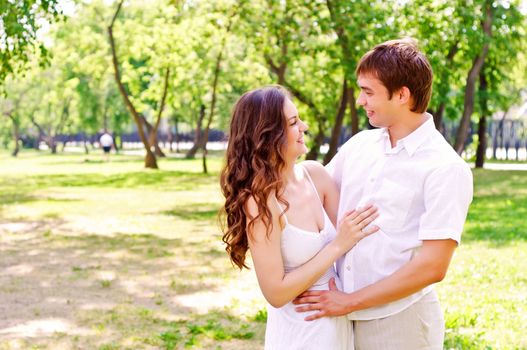 couple hugging in the park, have a good time together