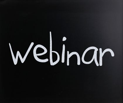 The word "Webinar" handwritten with white chalk on a blackboard