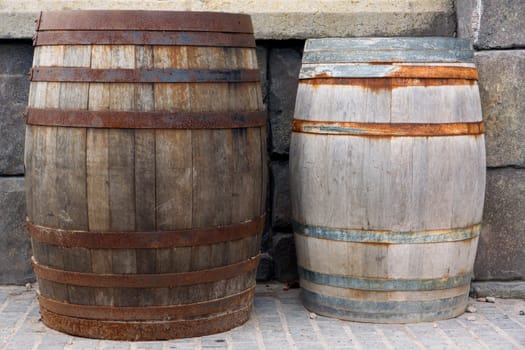 Vintage style barrels against a wall