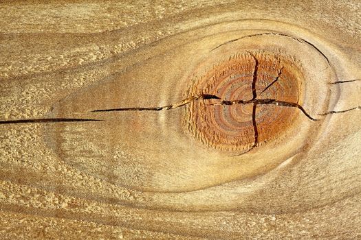 Texture of wood with knot and cracks
