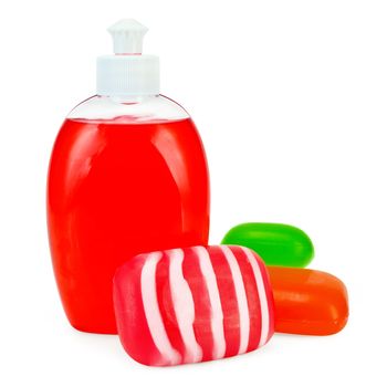 Red liquid soap in a bottle, solid red, green and striped soap isolated on white background