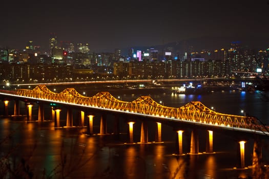 Panoramic view of seoul and bridge over Han river in night