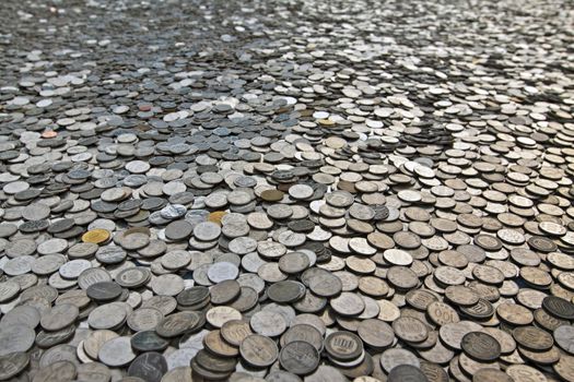 A heap of korean won coins with shallow depth of focus